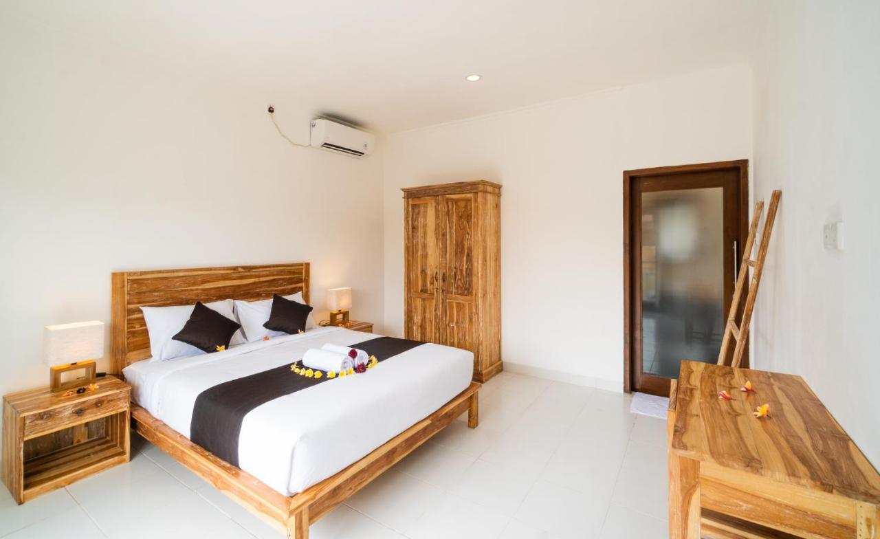 Wooden Puri Guesthouse Uluwatu Екстериор снимка